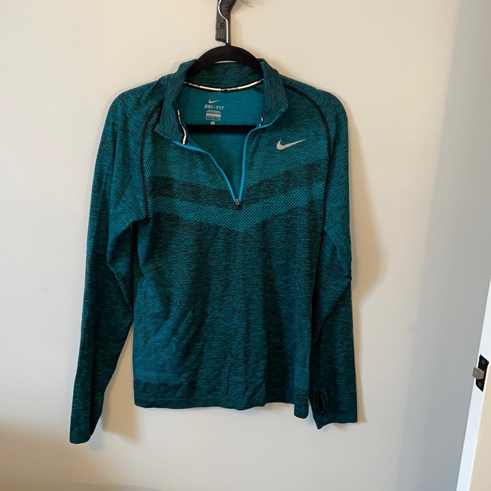 Nike Dri fit half zip jacket size Small, black and aqua